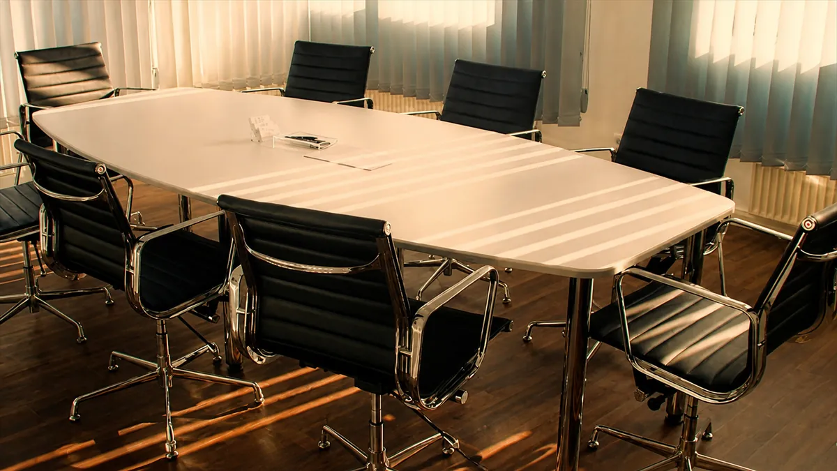 Empty conference room with black chairs
